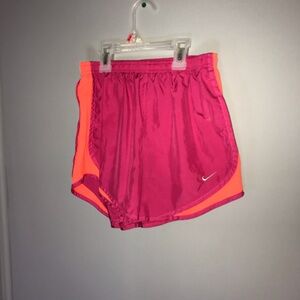 Nike pink and orange athletic shorts